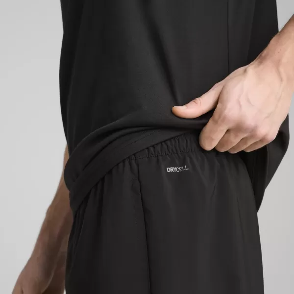  Къси панталони PUMA M TAD ESSENTIALS 7" WOVEN SHORT 52591001 PUMA BLACK 