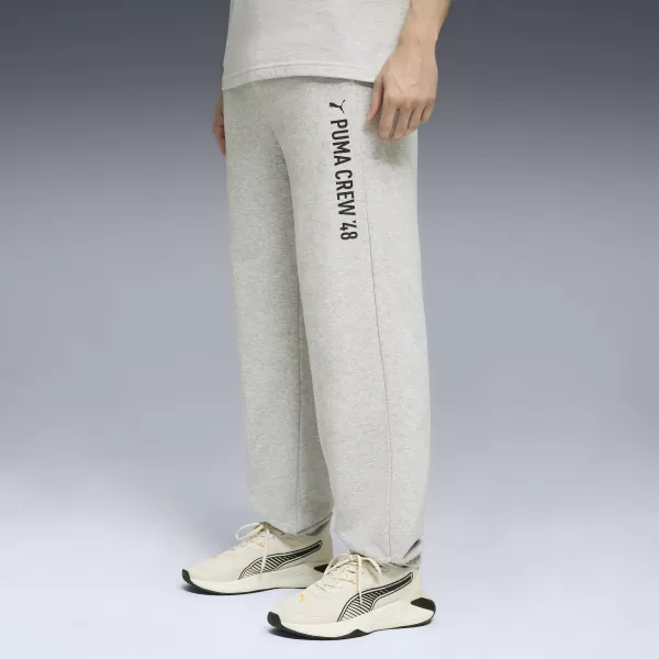  Мъжки спортен панталон PUMA M GRAPHIC FRENCH TERRY JOGGER 52770304 СВЕТЛОСИВ ПИРЕН 