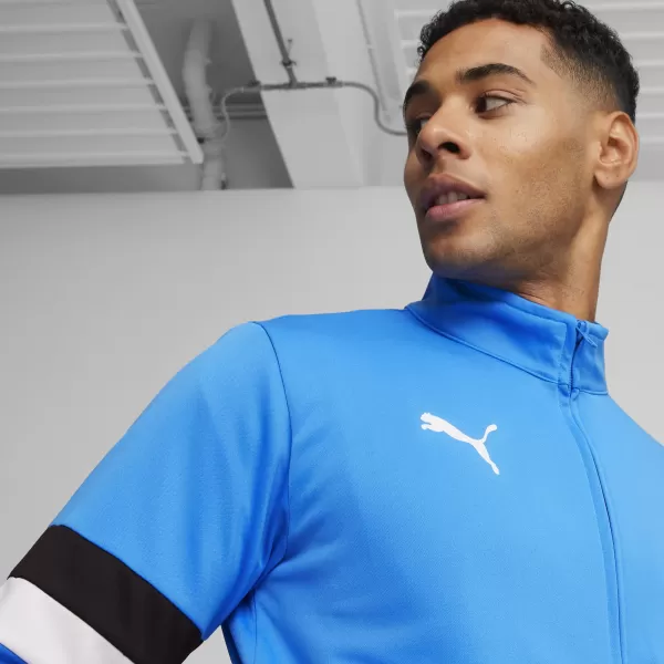  Мъжки комплект PUMA TEAMRISE TRACKSUIT 658653_02 IGNITE BLUE/ IGNITE BLUE/PUMA BLACK 