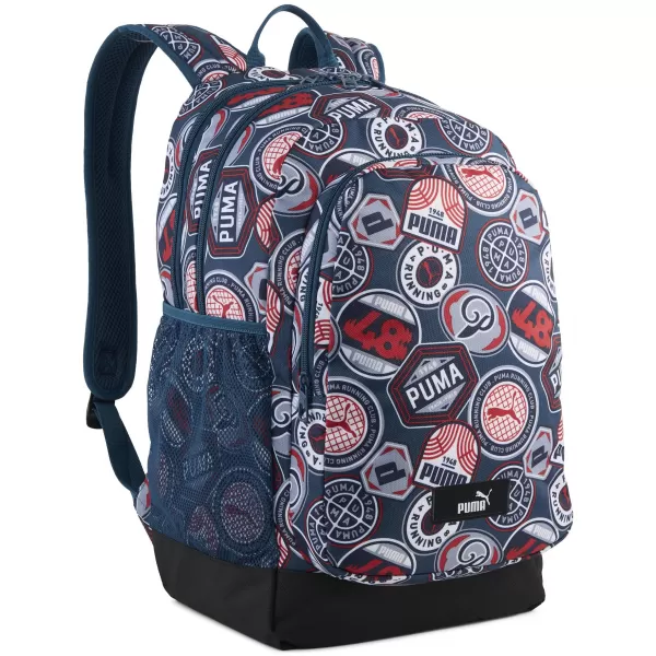  Раница PUMA ACADEMY AOP BACKPACK 09115027 MIDNIGHT PETROL/FOR ALL TIME RED/RUNNING BADGES AOP 